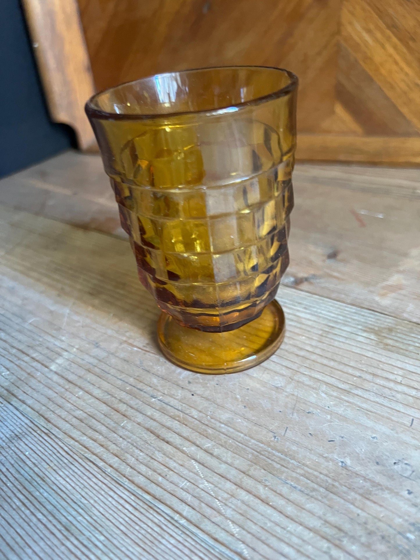Vintage footed tumbler. Indiana Whitehall Amber glass cubist design drink ware.