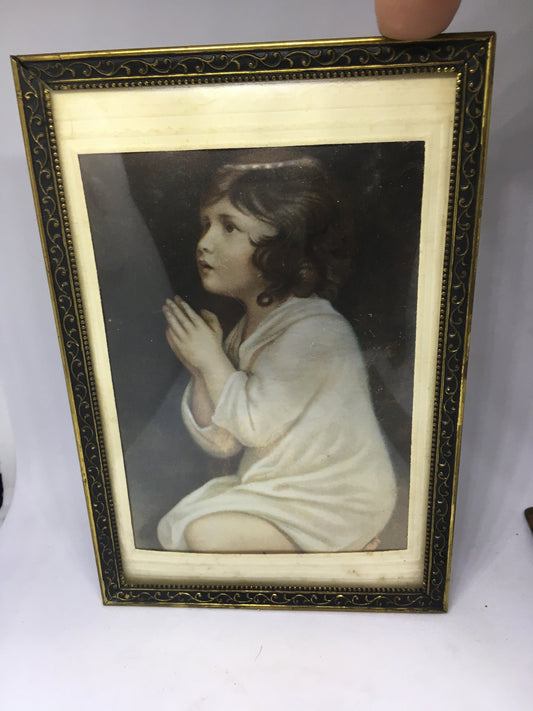 Beautiful framed iridescent photo of a little girl praying. Personalised letter in the back. Danish design.