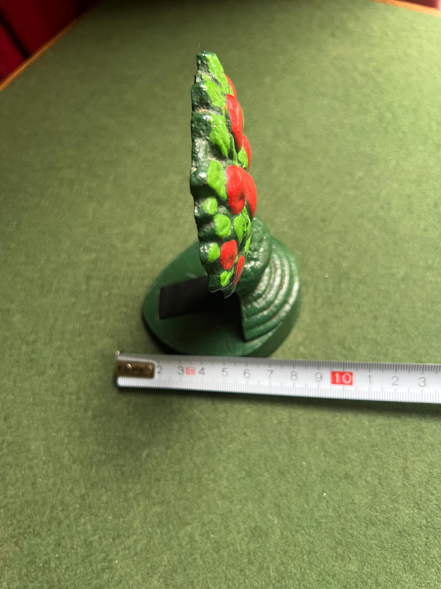 Vintage cast iron door stop. Hand painted red green Apple tree door wedge.