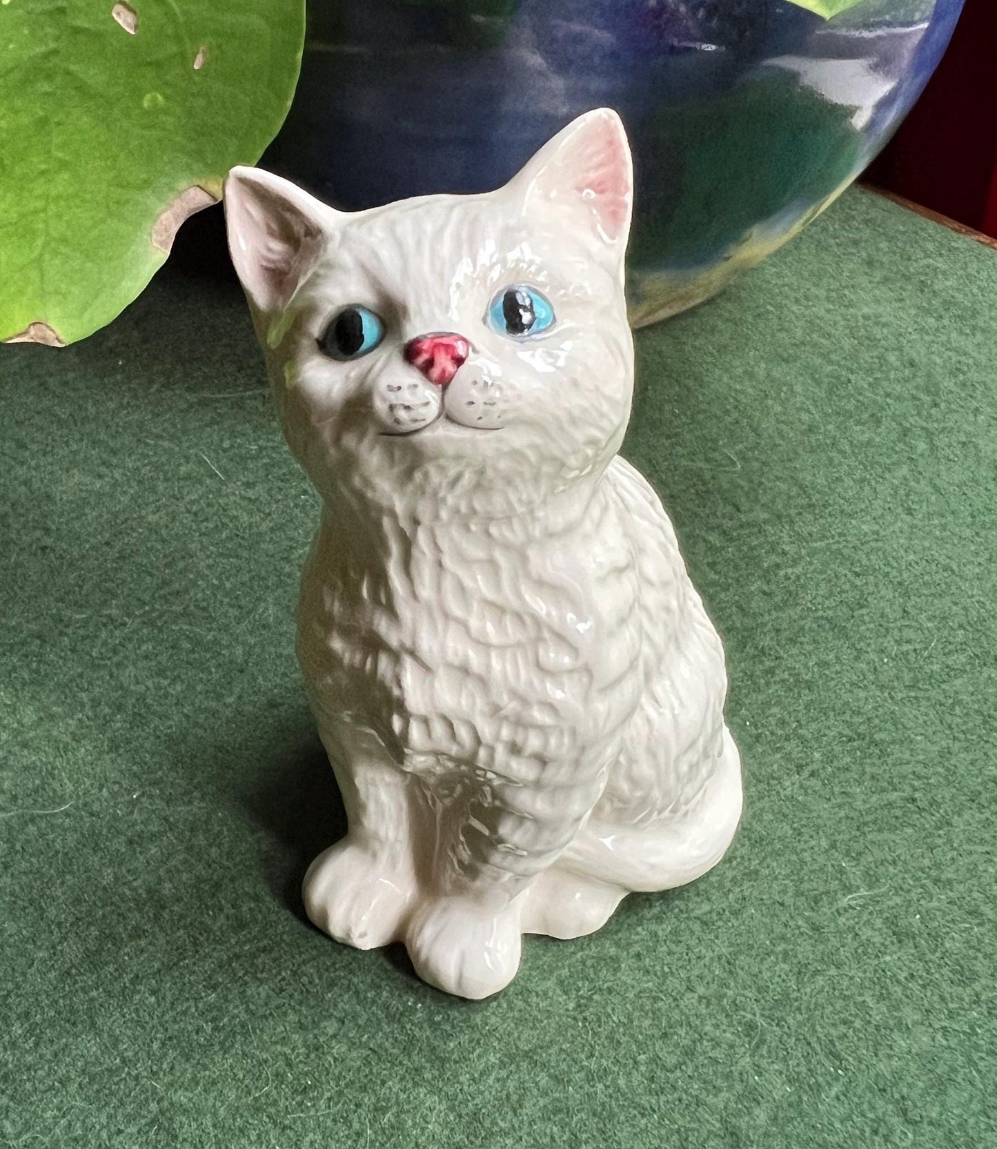 Royal Doulton Star gazing ceramic kitten.
