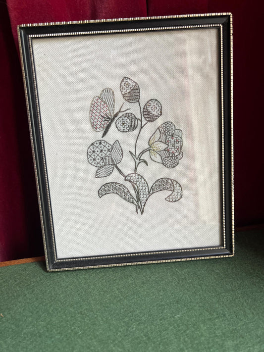 Vintage blackwork framed embroidery. Floral butterfly acorn theme hand stitched wall art.