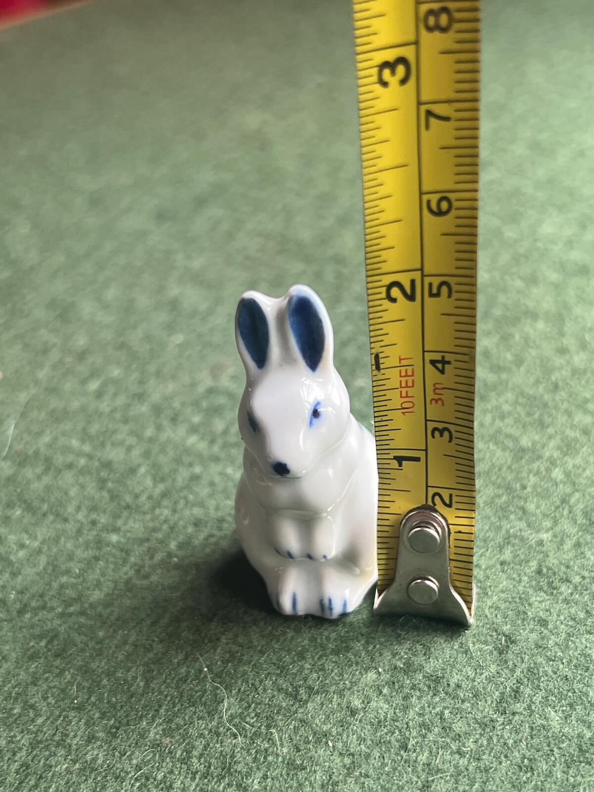Miniature ceramic bunny figurine. Blue white delft style hand painted rabbit.