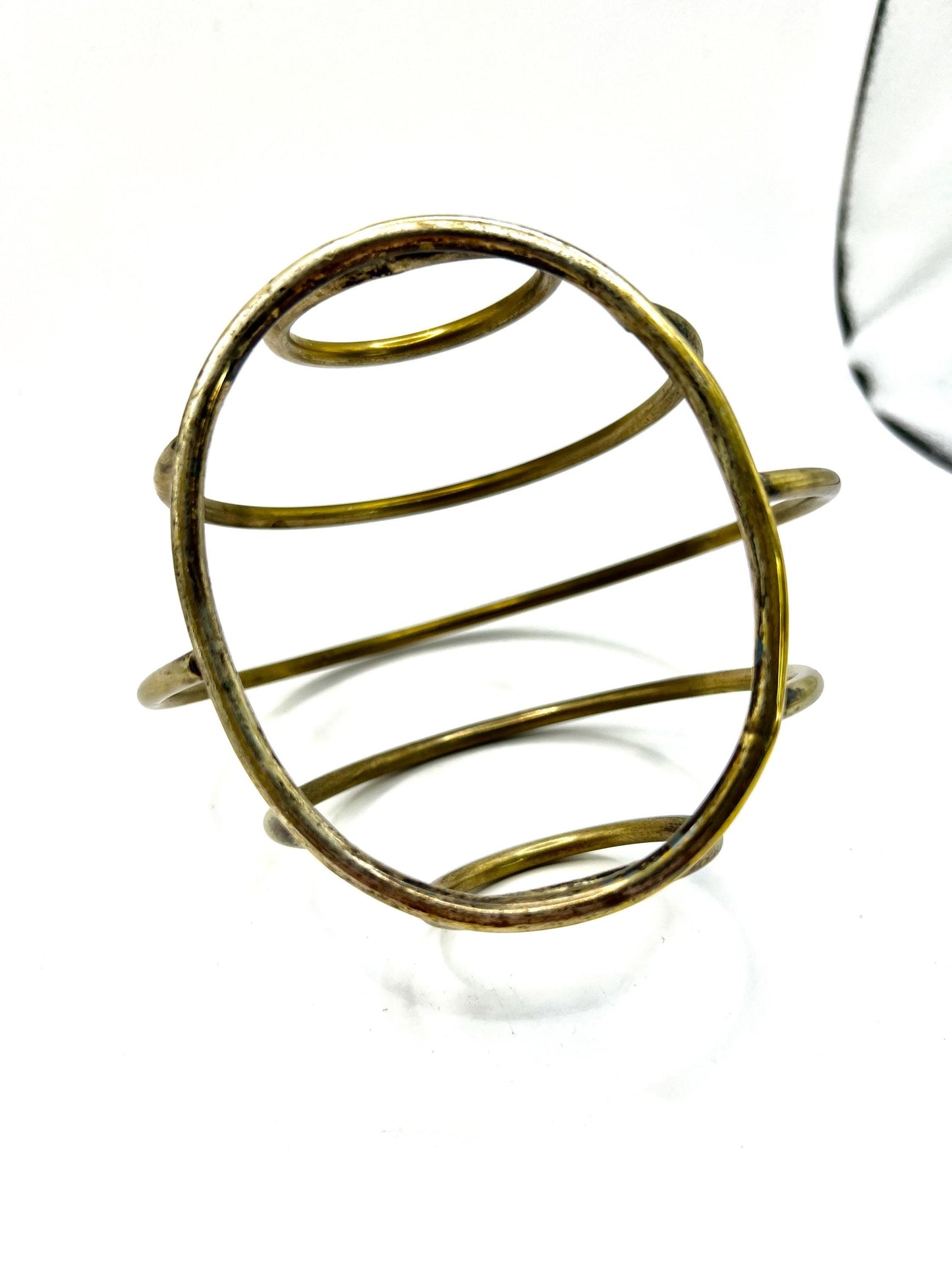 Unusual brass letter holder. Circular design vintage brass napkin holder toast rack.