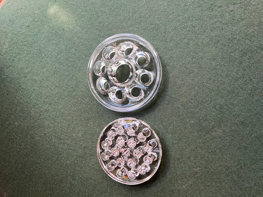 Vintage clear glass flower frogs. 2 available Sold separately.