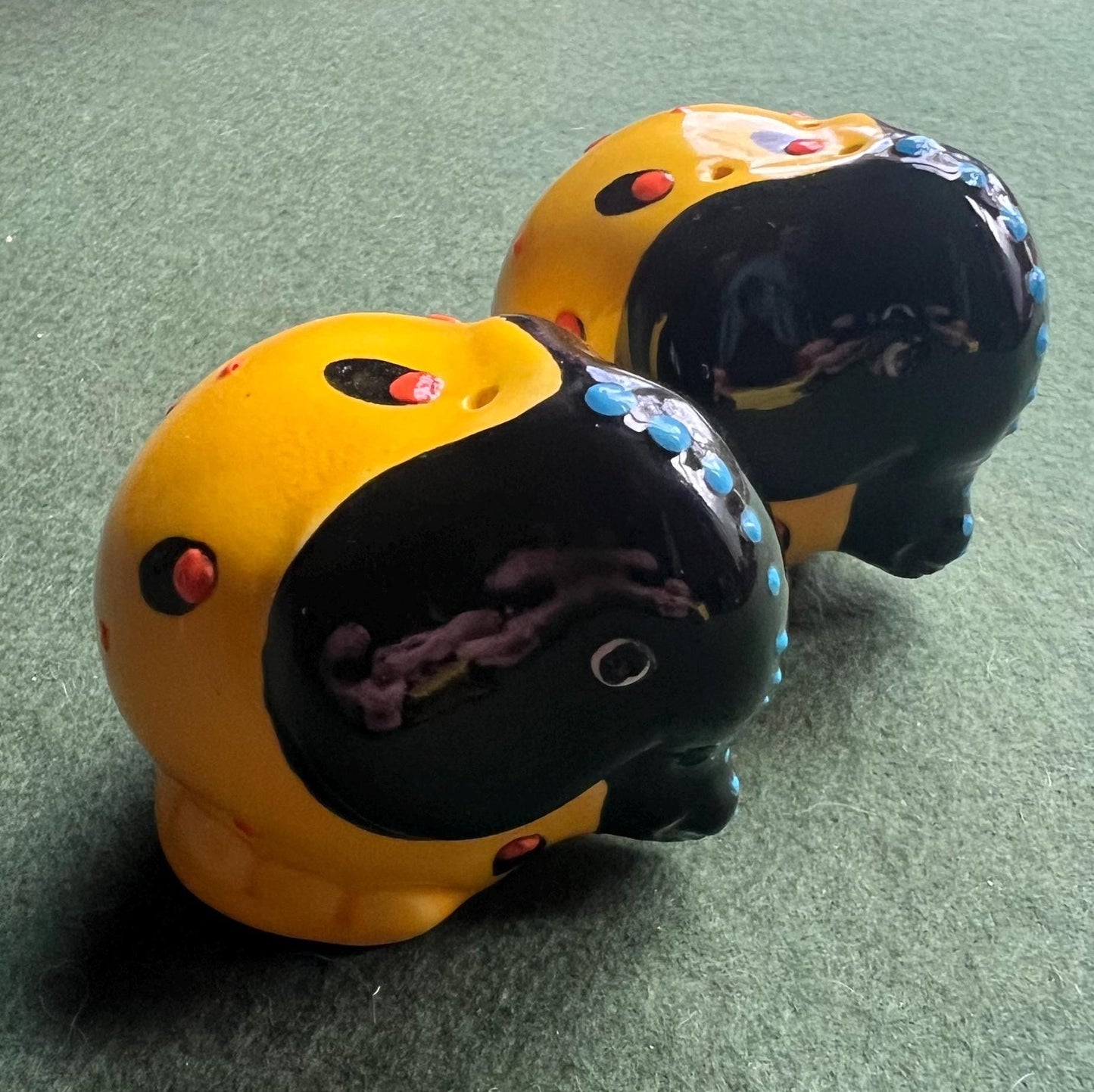 Quirky elephant salt and pepper shakers. Signed to base SUNA SA.