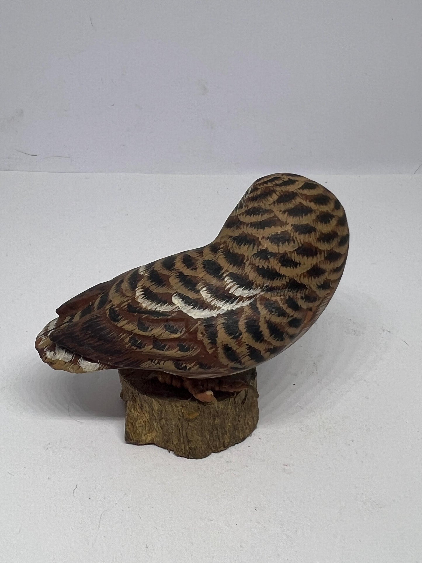 Vintage Hand Carved Wood Saw Whet Owl Hand painted with glass eyes on tree stump base.