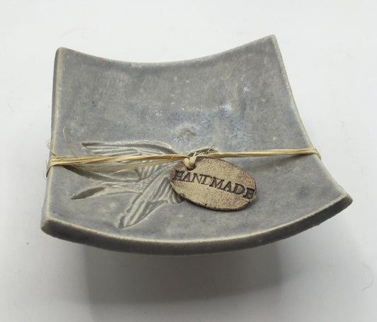 Handmade pedestal square trinket dish. Sgraffito flying bird design.