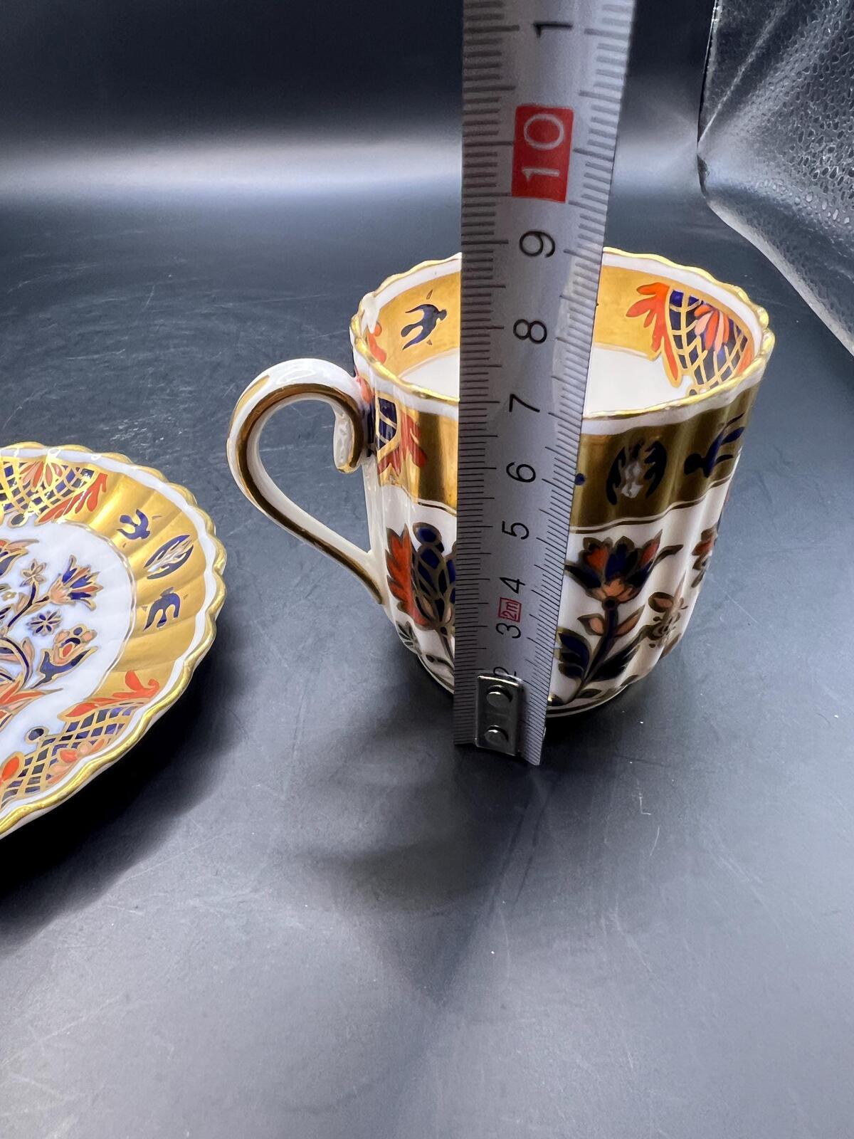 Antique coffee can / tea cup and saucer. Vibrant Imari pattern with gold gilt. Stamped Copeland 5.257. AS IS