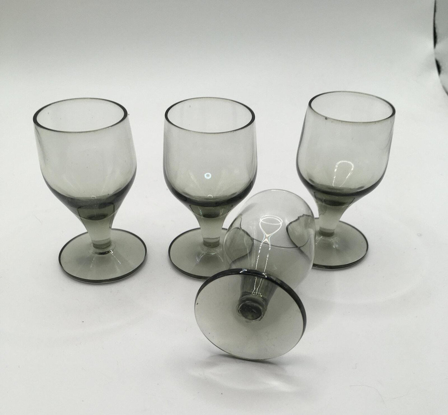 Set of 4 smoky grey sherry port glasses. Mid Century Modern Bar ware.