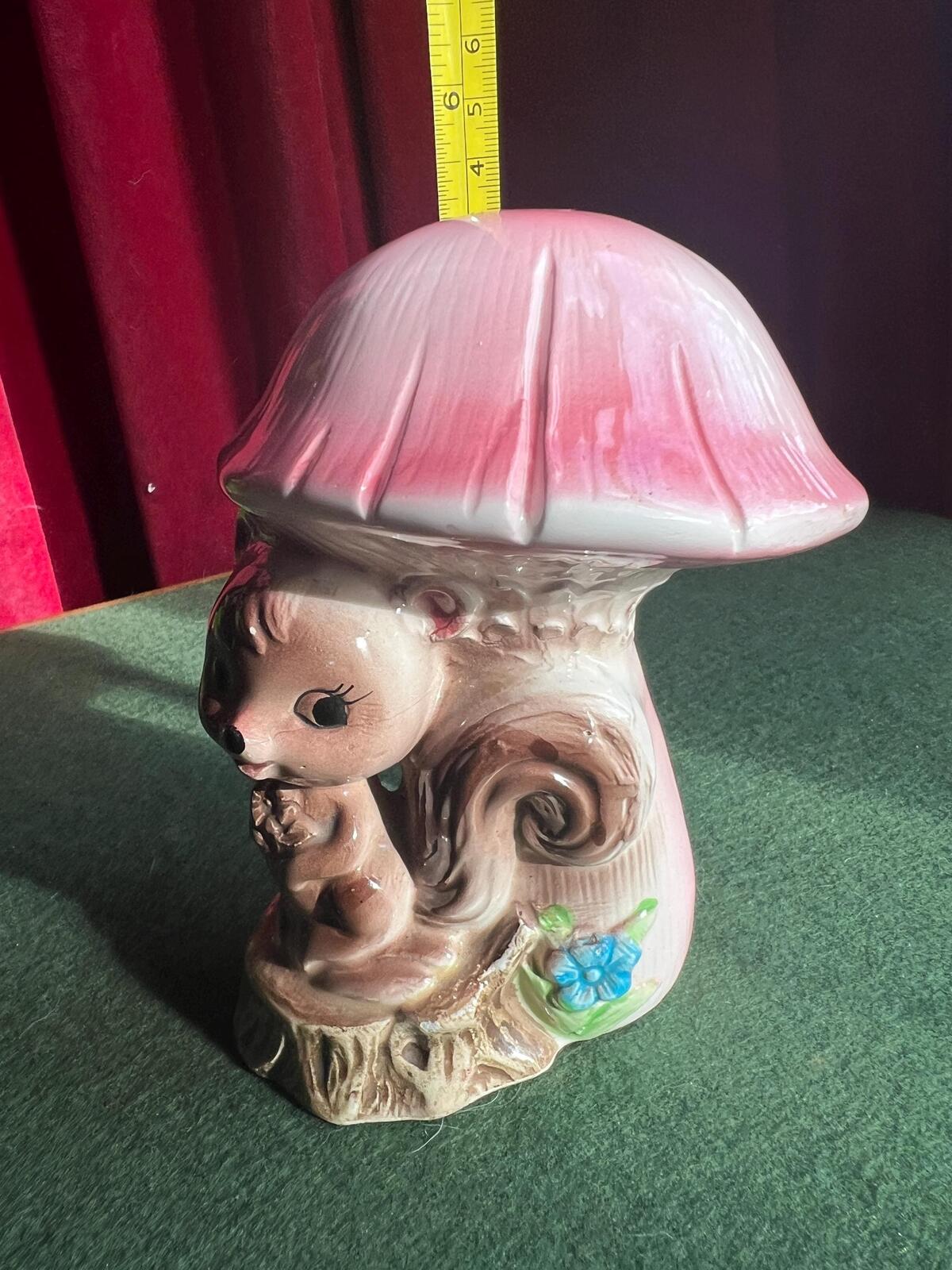 Quirky Squirrel money bank. Kitsch anthropomorphic squirrel sitting under a pink mushroom. MC decor.