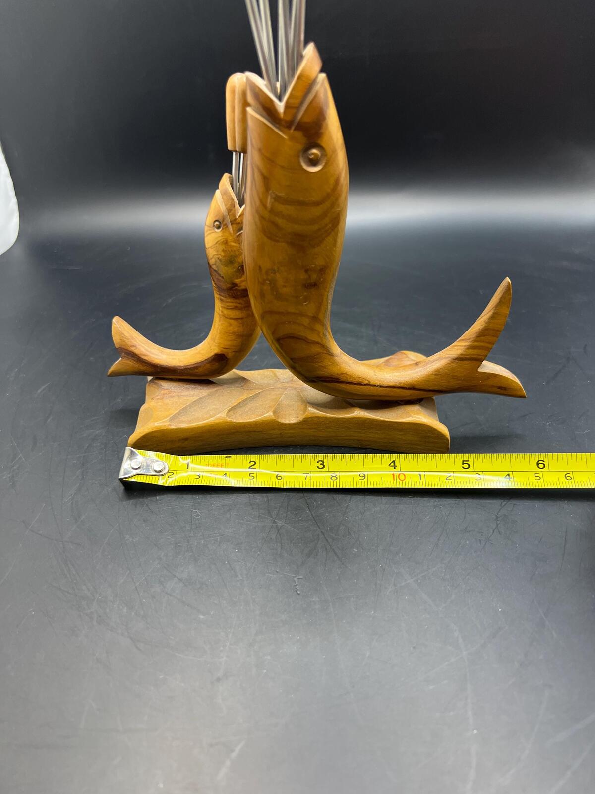 Wooden olive serving set. MCM carved olive wood fish design with 6 forks and 4 picks.