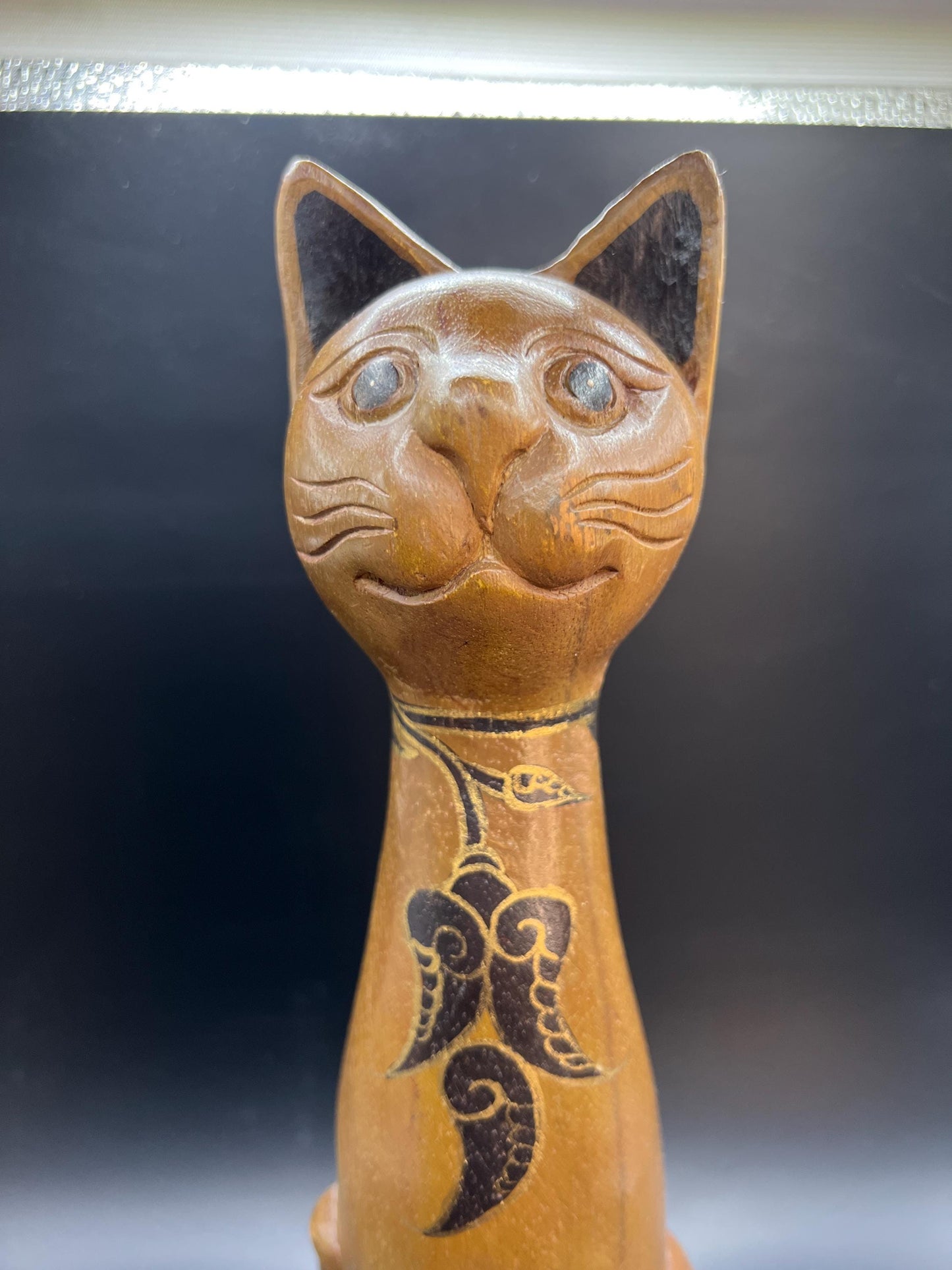 Hand carved wooden cat figurine. Made in Thailand.