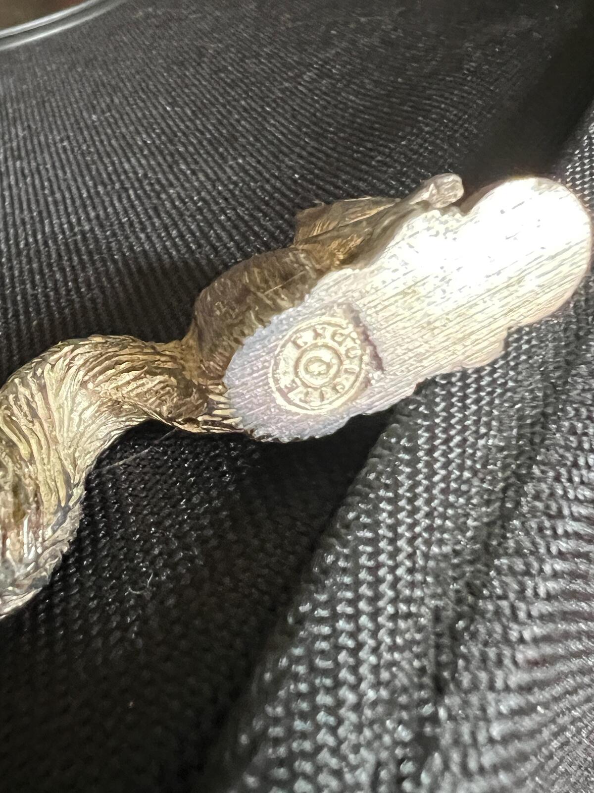 Vintage silver tone squirrel figurine. Miniature metal squirrel ornament.
