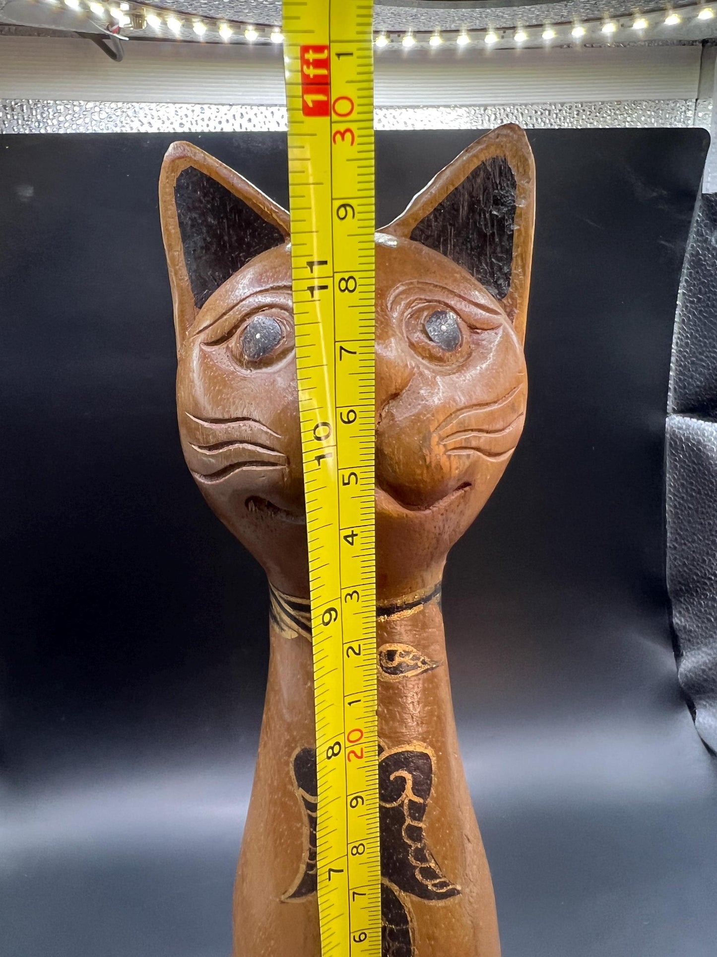 Hand carved wooden cat figurine. Made in Thailand.