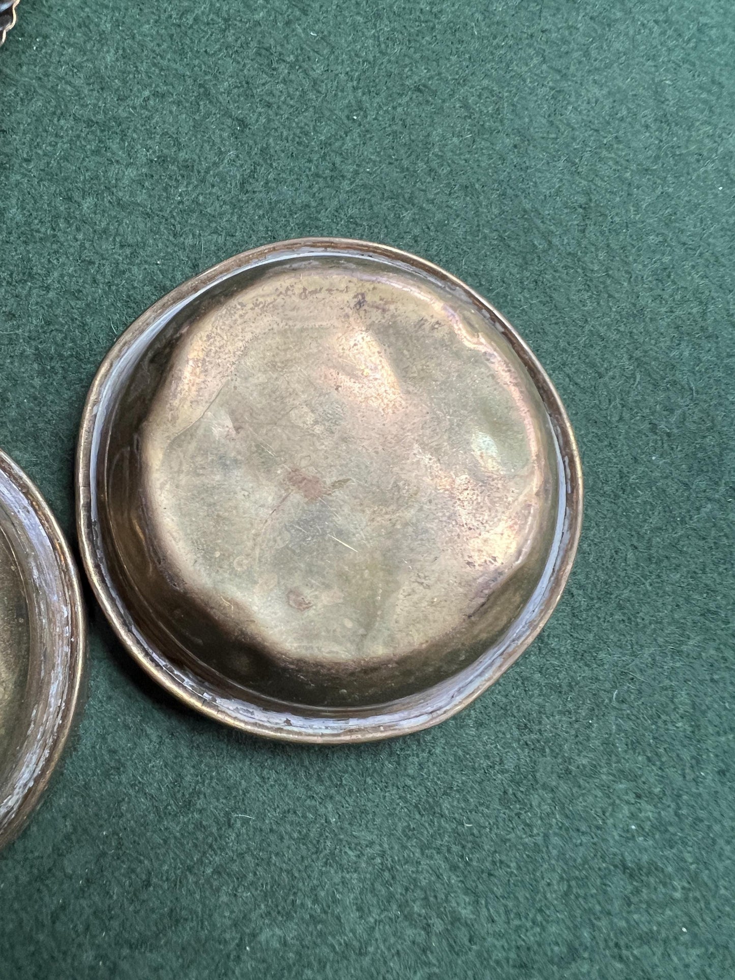 Quirky enamel brass stacking ashtrays on tortoise base.