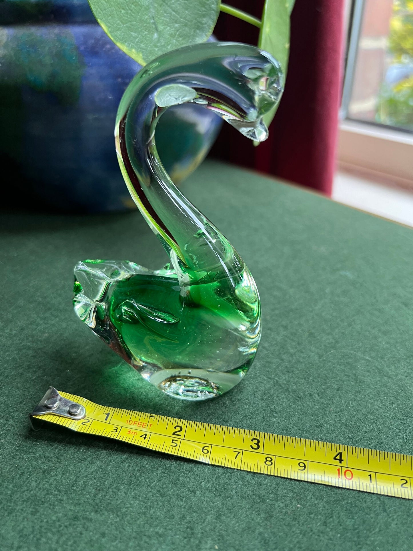 Beautiful hand blown green glass swan figurine.