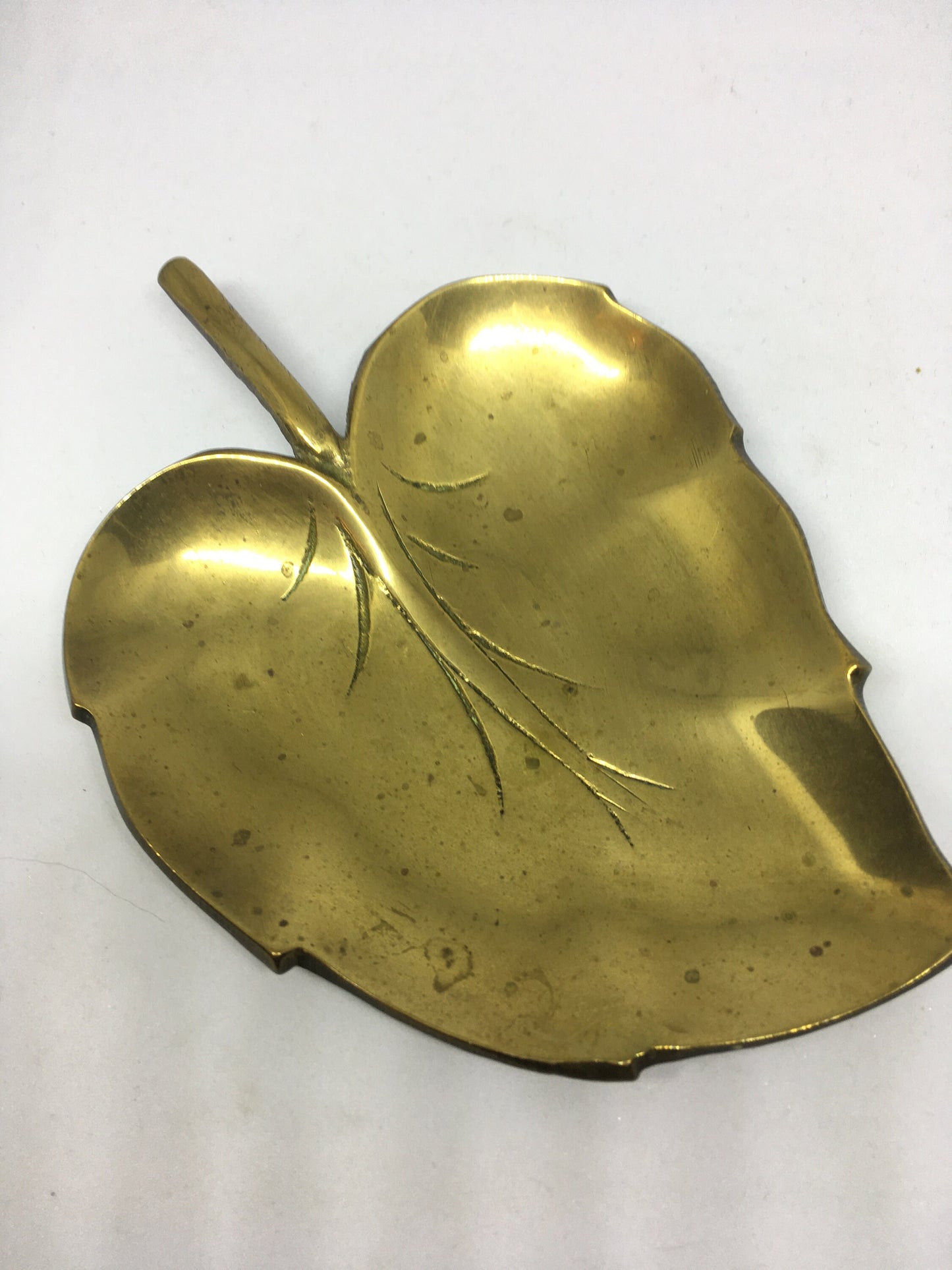 Decorative brass leaf trinket key dish.