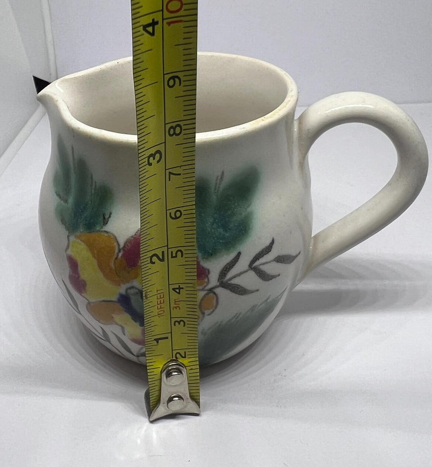 Vintage milk jug creamer. Stamped Buchan Scotland Summertime.