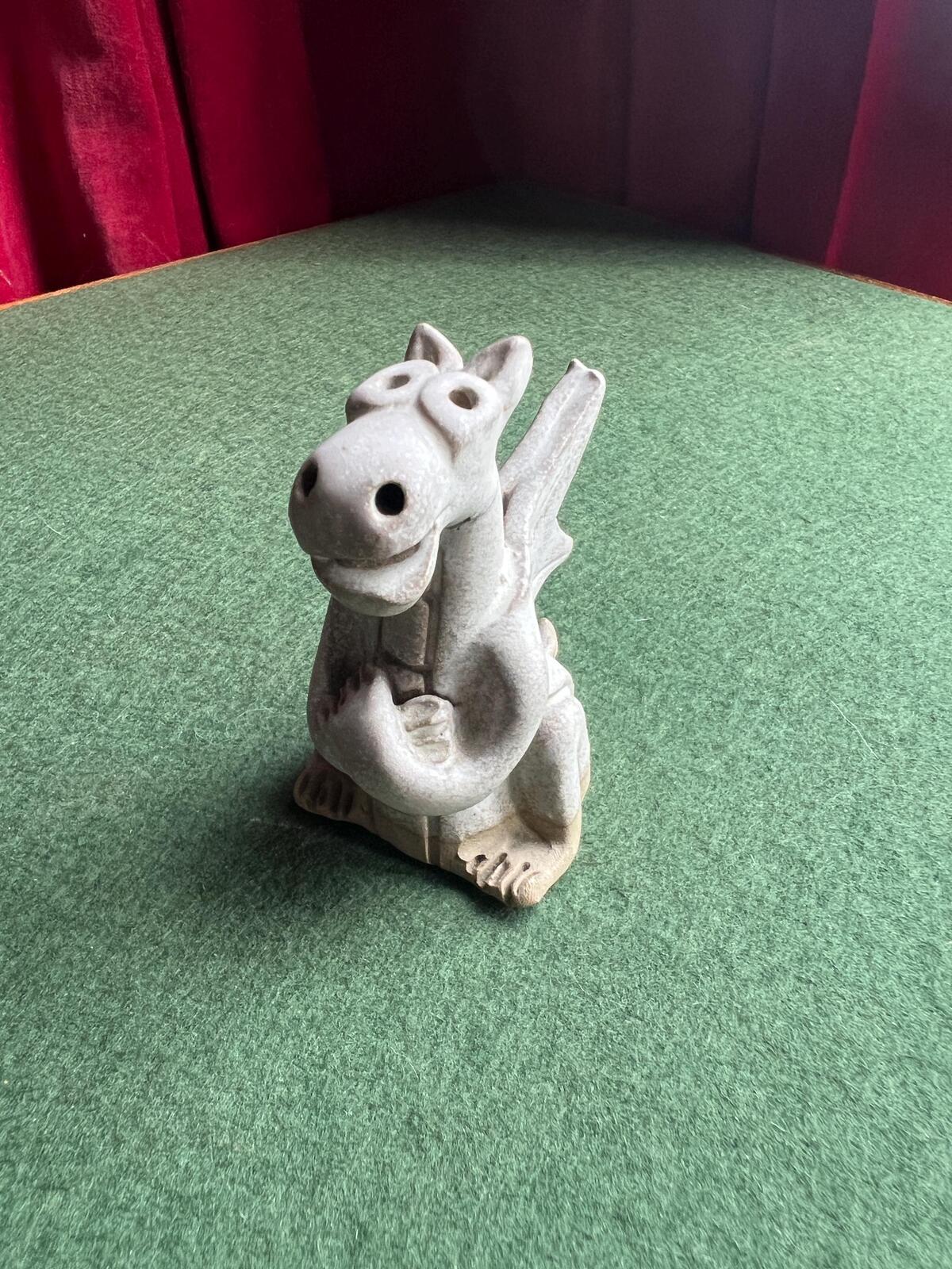 Hand built pottery dragon figurine. Grey clay ready to be painted dragon.