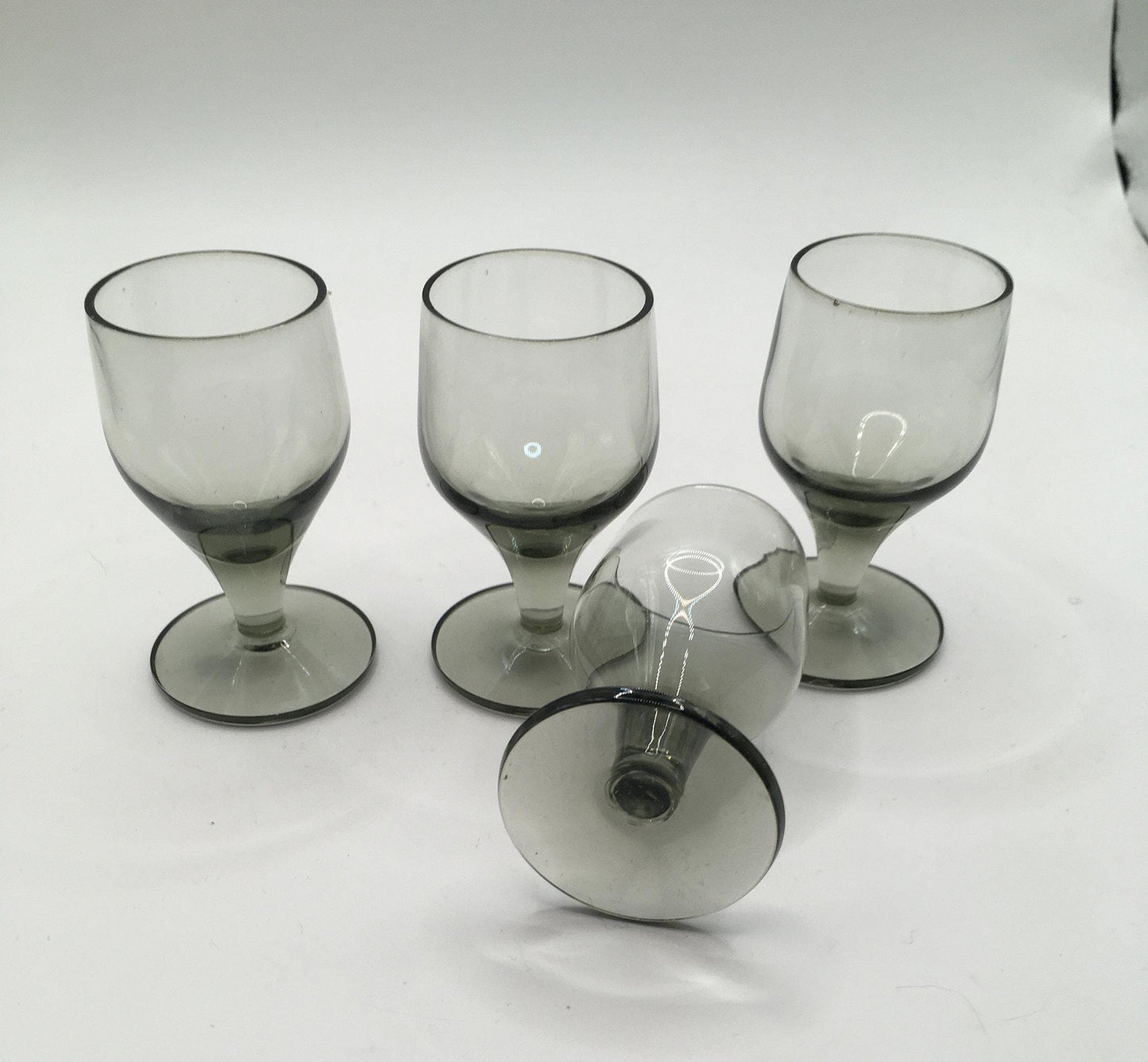 Set of 4 smoky grey sherry port glasses. Mid Century Modern Bar ware.