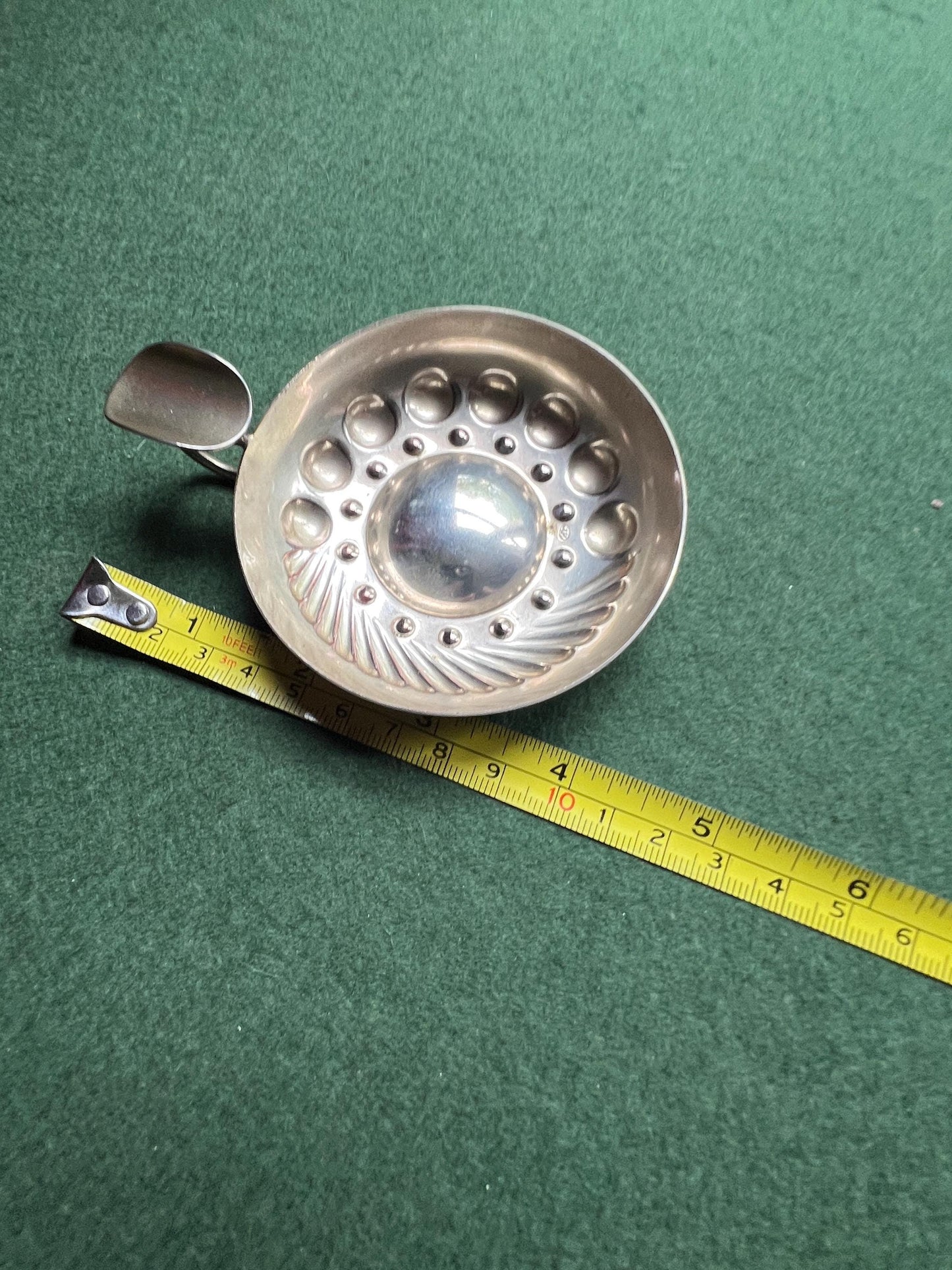 Vintage silver tone tastevin. Vintage barware.