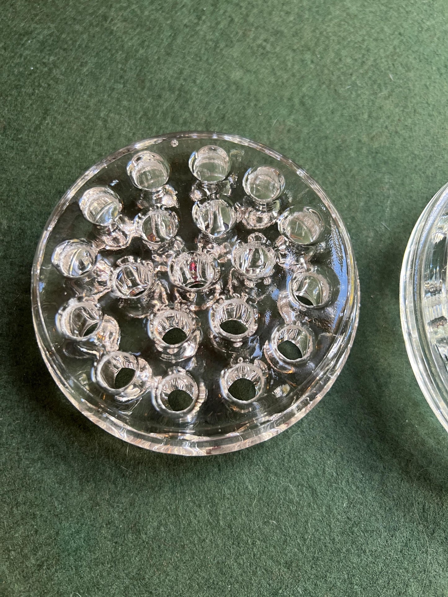 Vintage clear glass flower frogs. 2 available Sold separately.