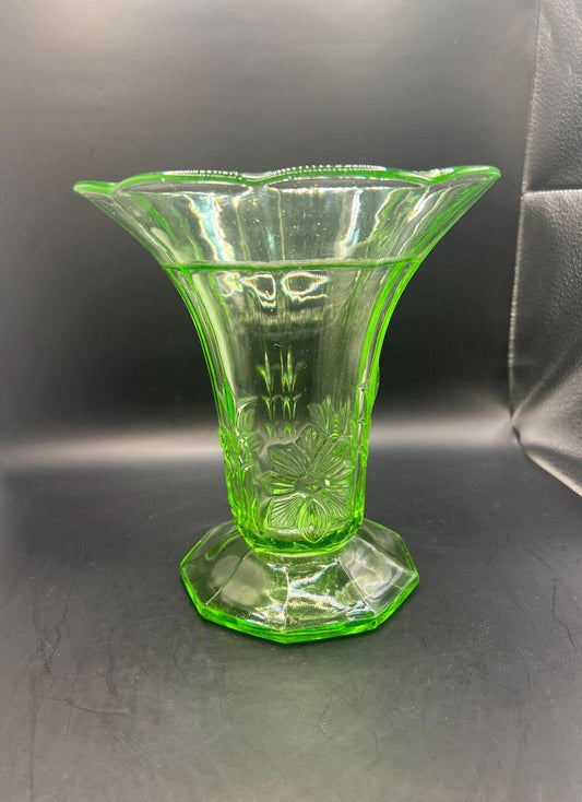 Vintage antique uranium glass vase. Octagonal base with flared ruffle rim and floral imprint.