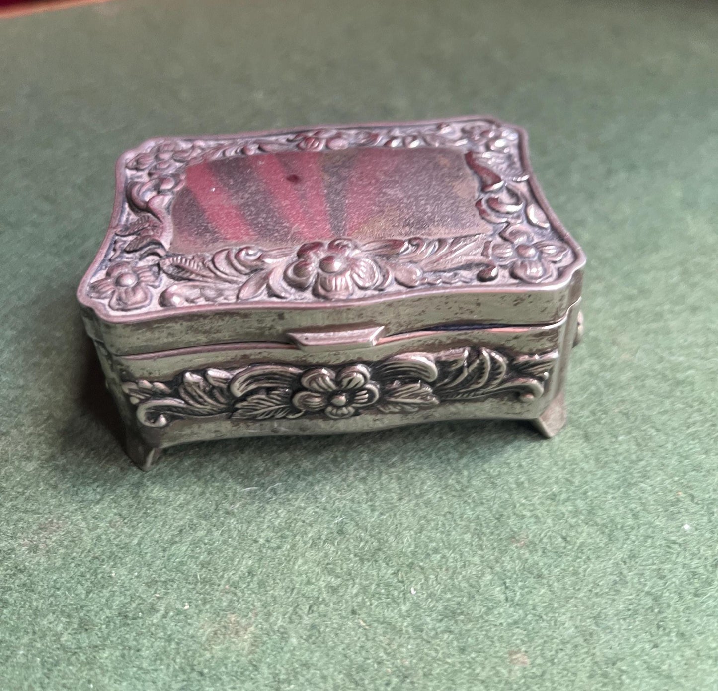Vintage silver tone jewellery box. Embossed floral design treasure box blue lining.