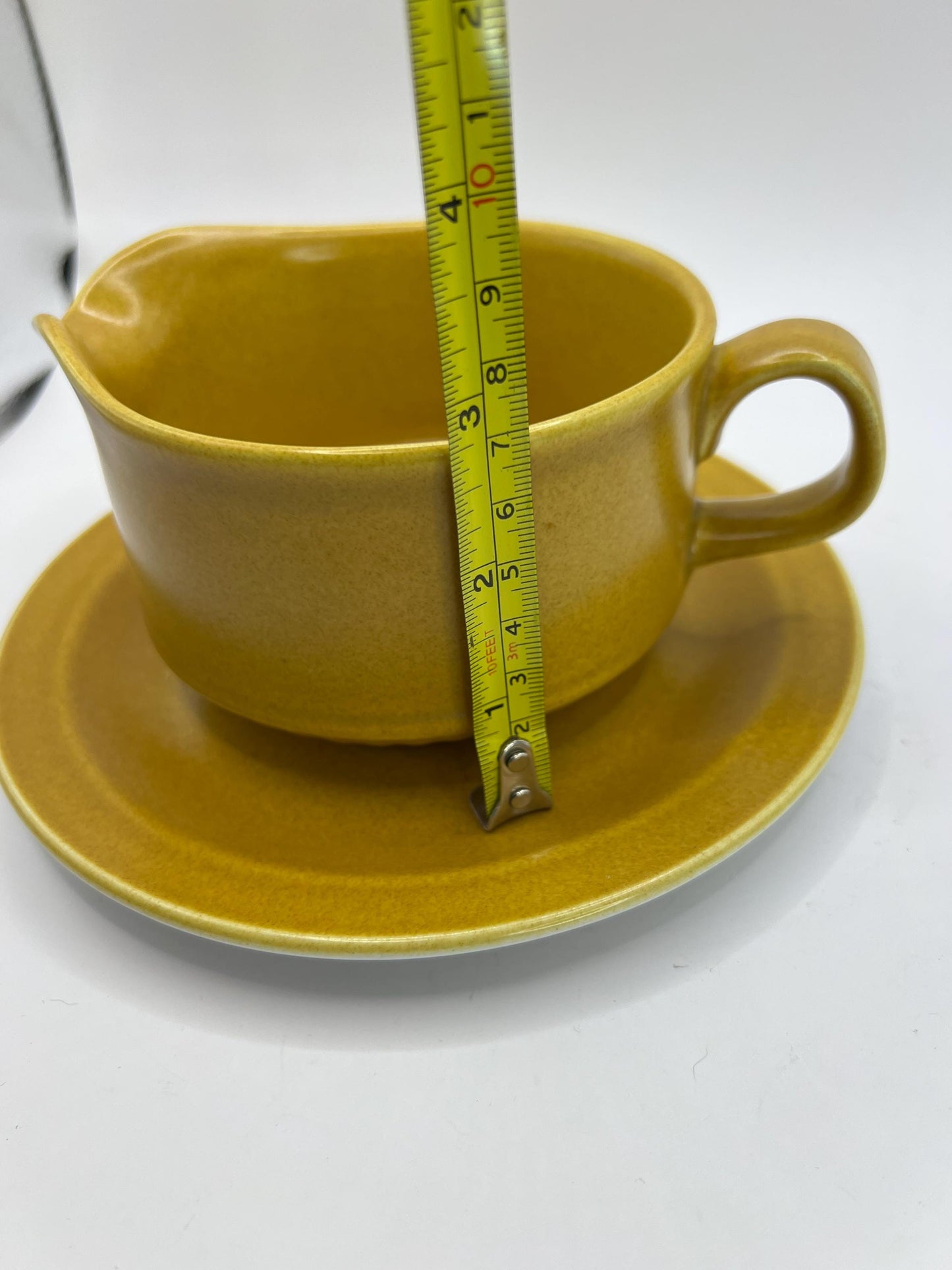 Mustard yellow ceramic gravy sauce boat and saucer. Stamped Glo-white Ironstone Alfred Meakin England.