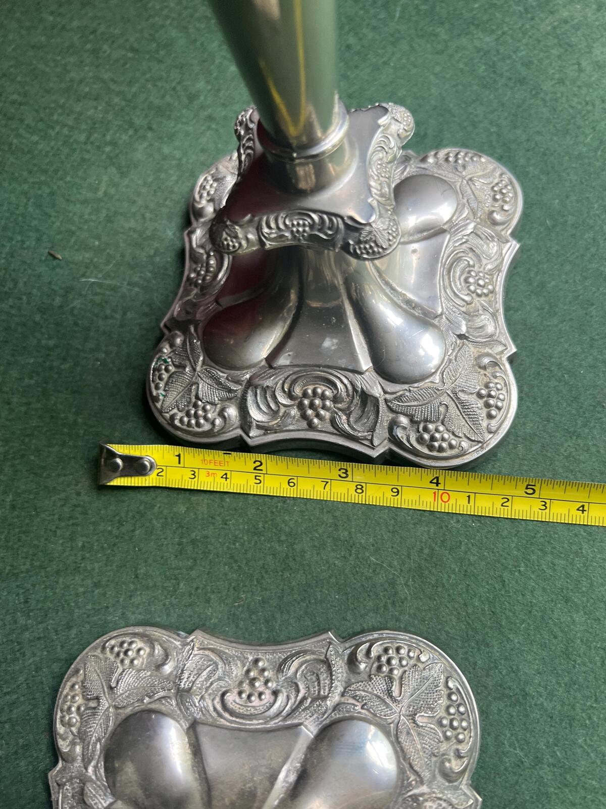 Pair of Vintage antique candlestick holders. Grape and vine pattern silver plated 3 arm candle holders. Mismatched heights.
