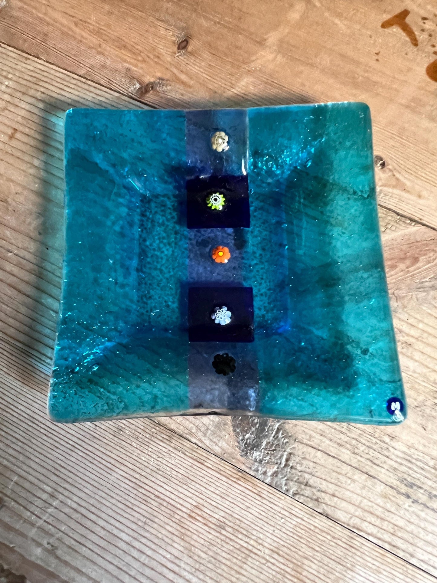 Vintage Murano fused glass trinket dish. Blue glass square plate with millefiori detail.