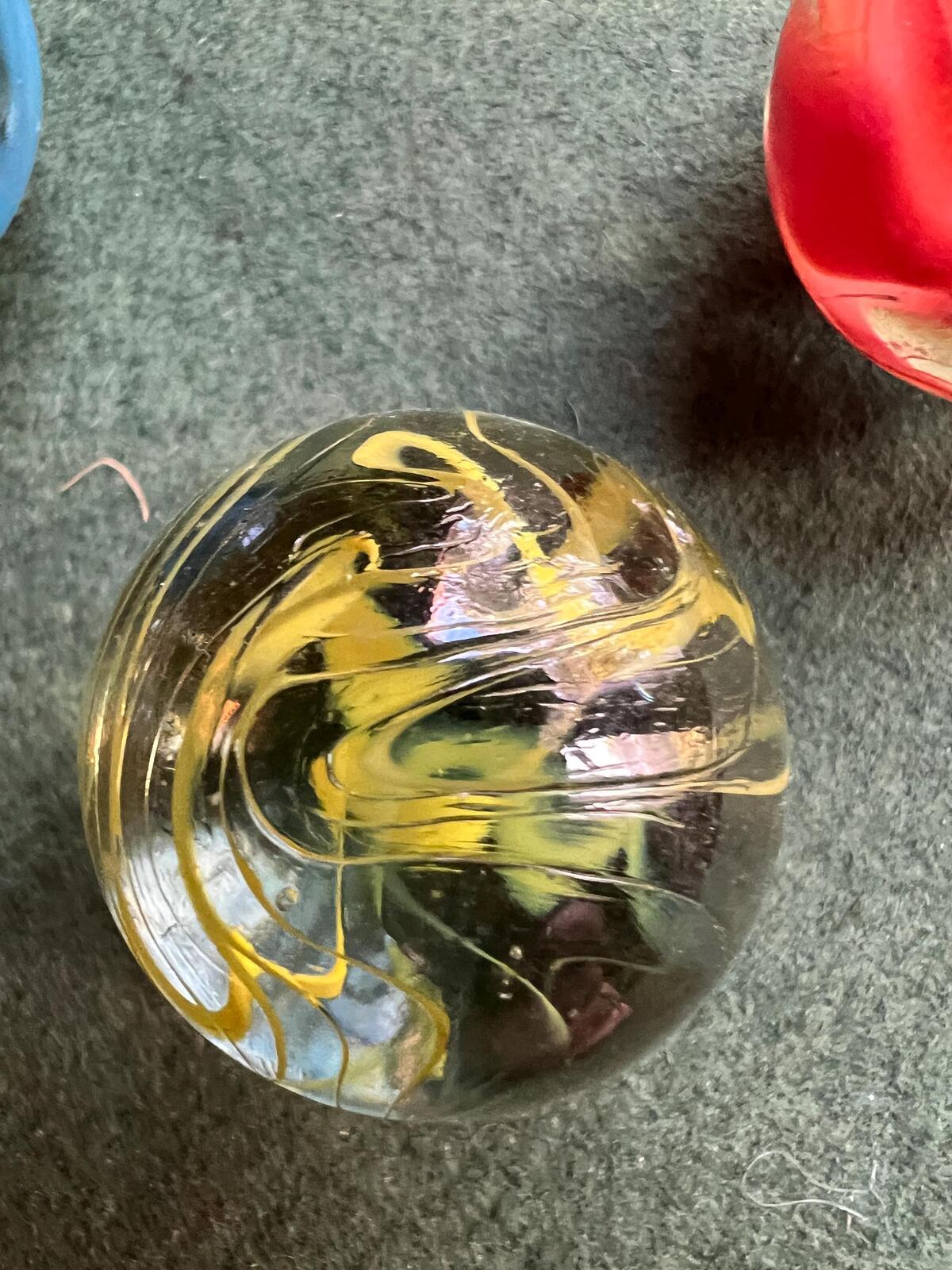 Set 3 vintage dobber marbles. Red Yellow blue spaghetti swirl.