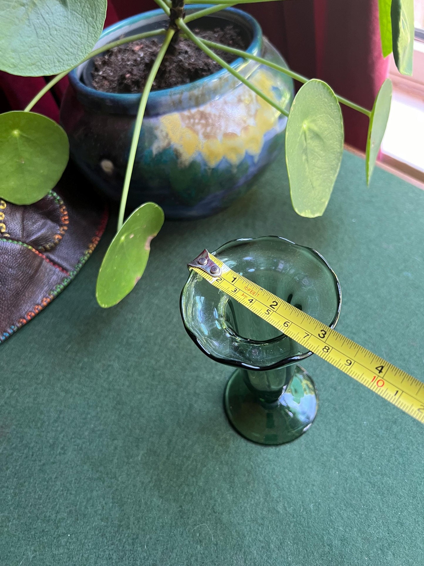 Green glass vase.