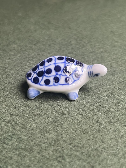 Vintage miniature tortoise figurine. Blue white ceramic hand painted turtle ornament.