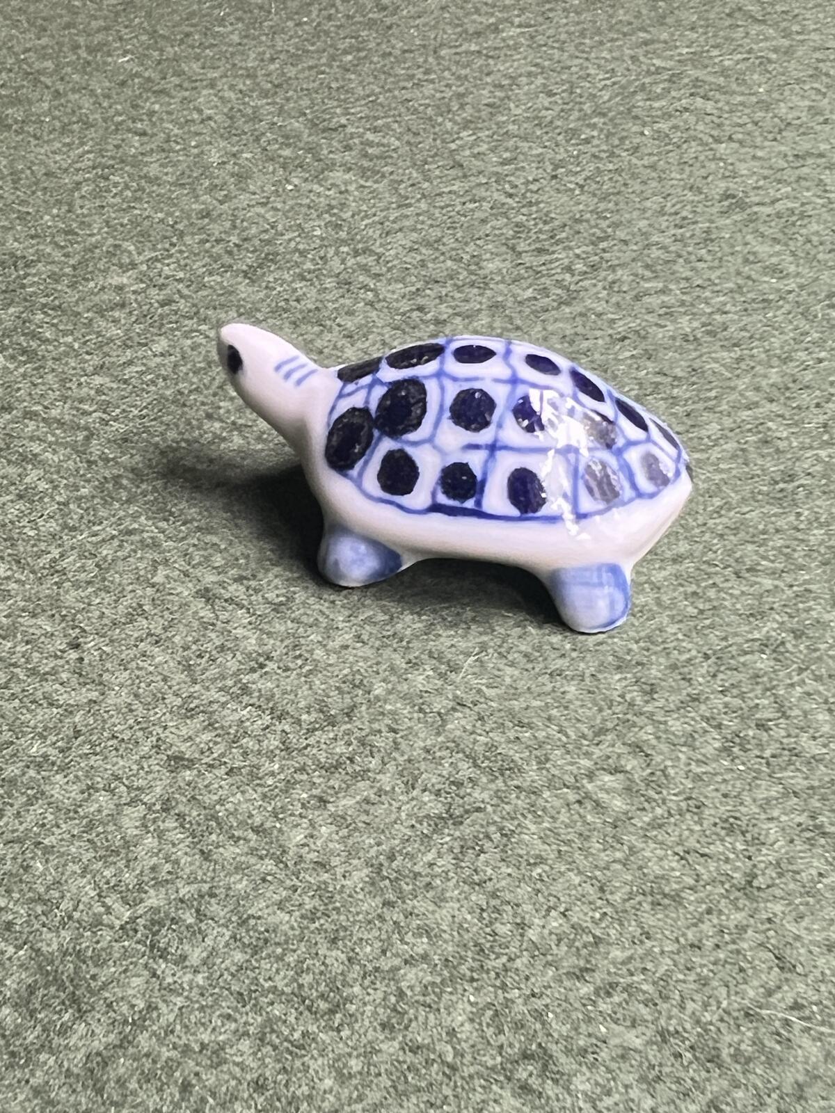 Vintage miniature tortoise figurine. Blue white ceramic hand painted turtle ornament.