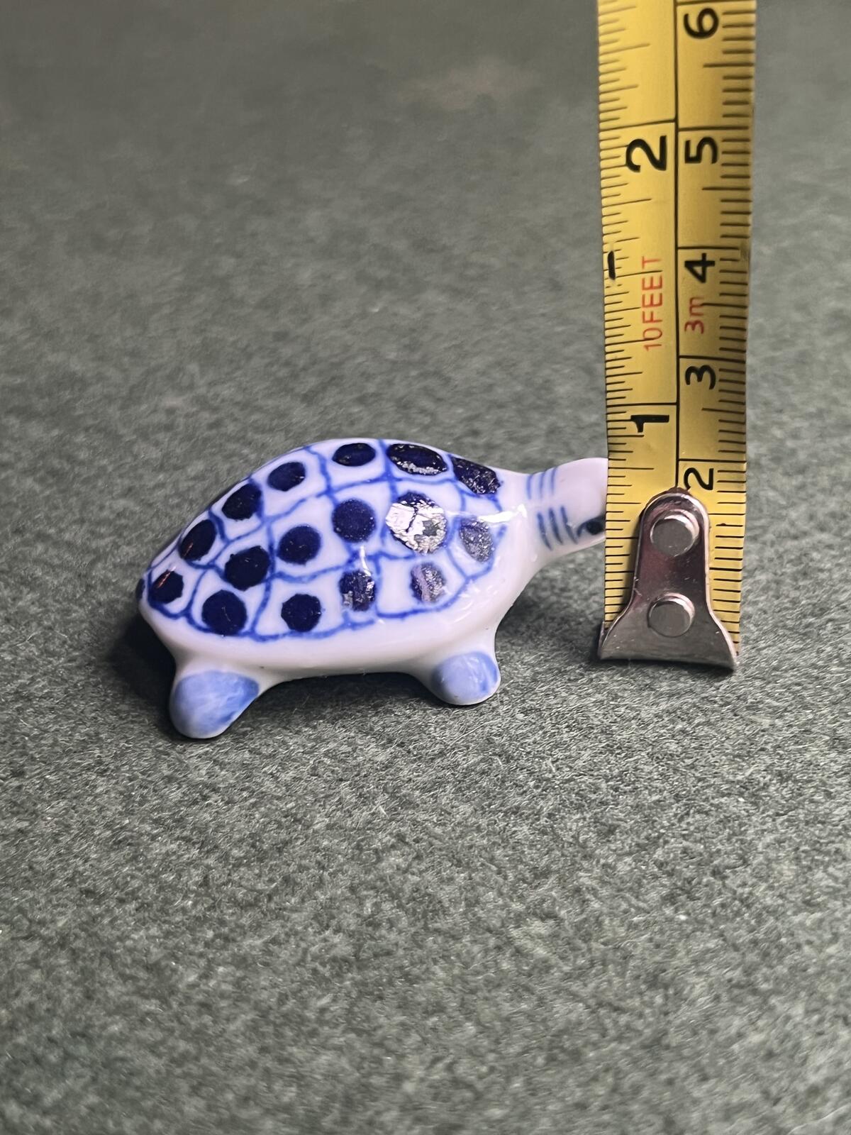 Vintage miniature tortoise figurine. Blue white ceramic hand painted turtle ornament.