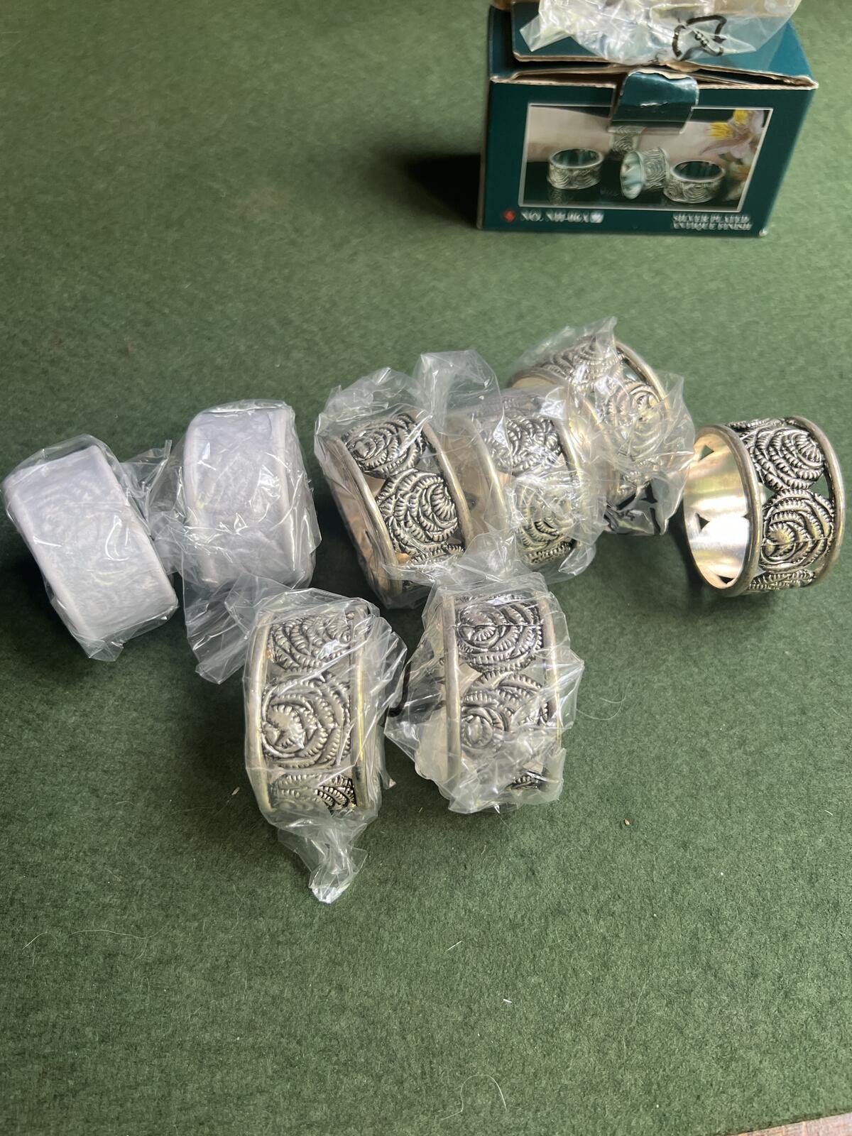 Vintage silver plate napkin rings. Rose theme design. 2 original boxes 8 in total.