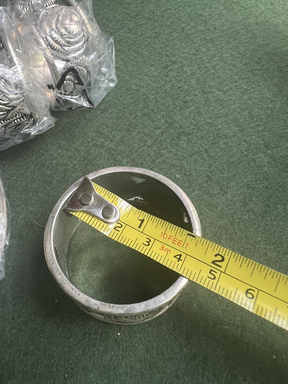 Vintage silver plate napkin rings. Rose theme design. 2 original boxes 8 in total.