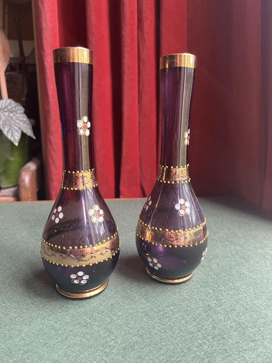 Pair of Bohemian amethyst glass bud vases. Gold enamelled floral decoration.