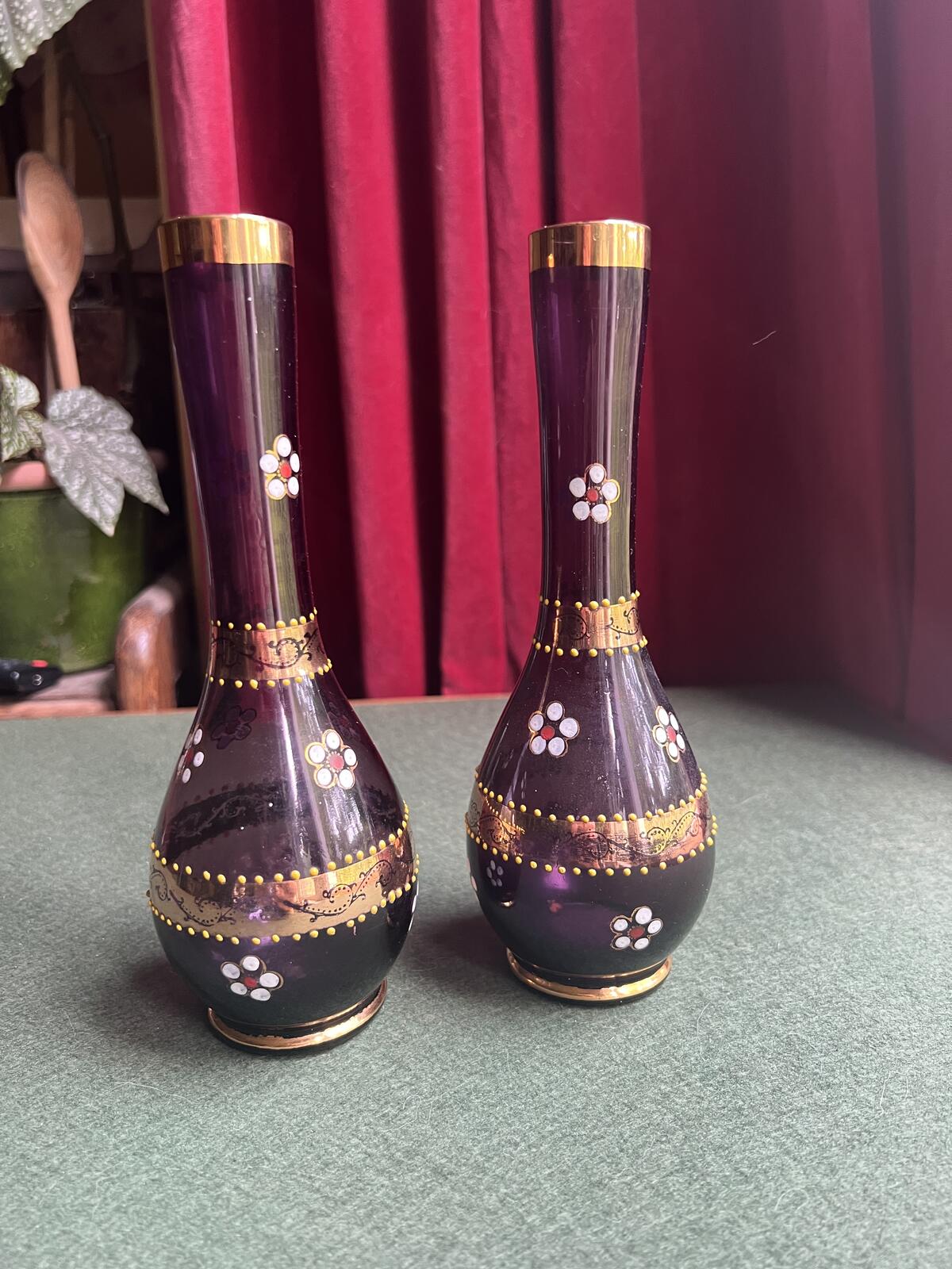 Pair of Bohemian amethyst glass bud vases. Gold enamelled floral decoration.
