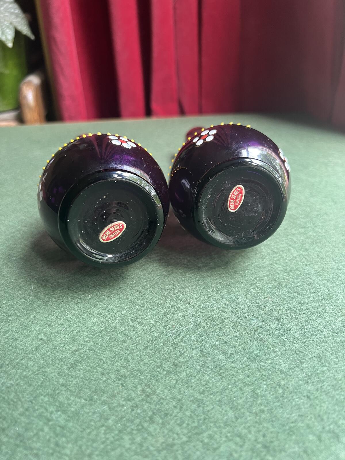 Pair of Bohemian amethyst glass bud vases. Gold enamelled floral decoration.