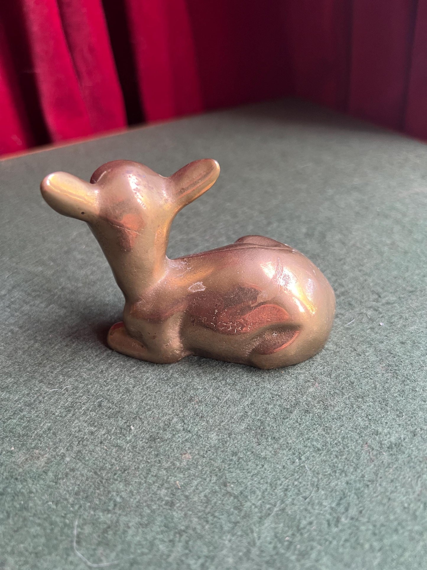 Vintage brass deer figurine. Resting fawn brass paperweight.