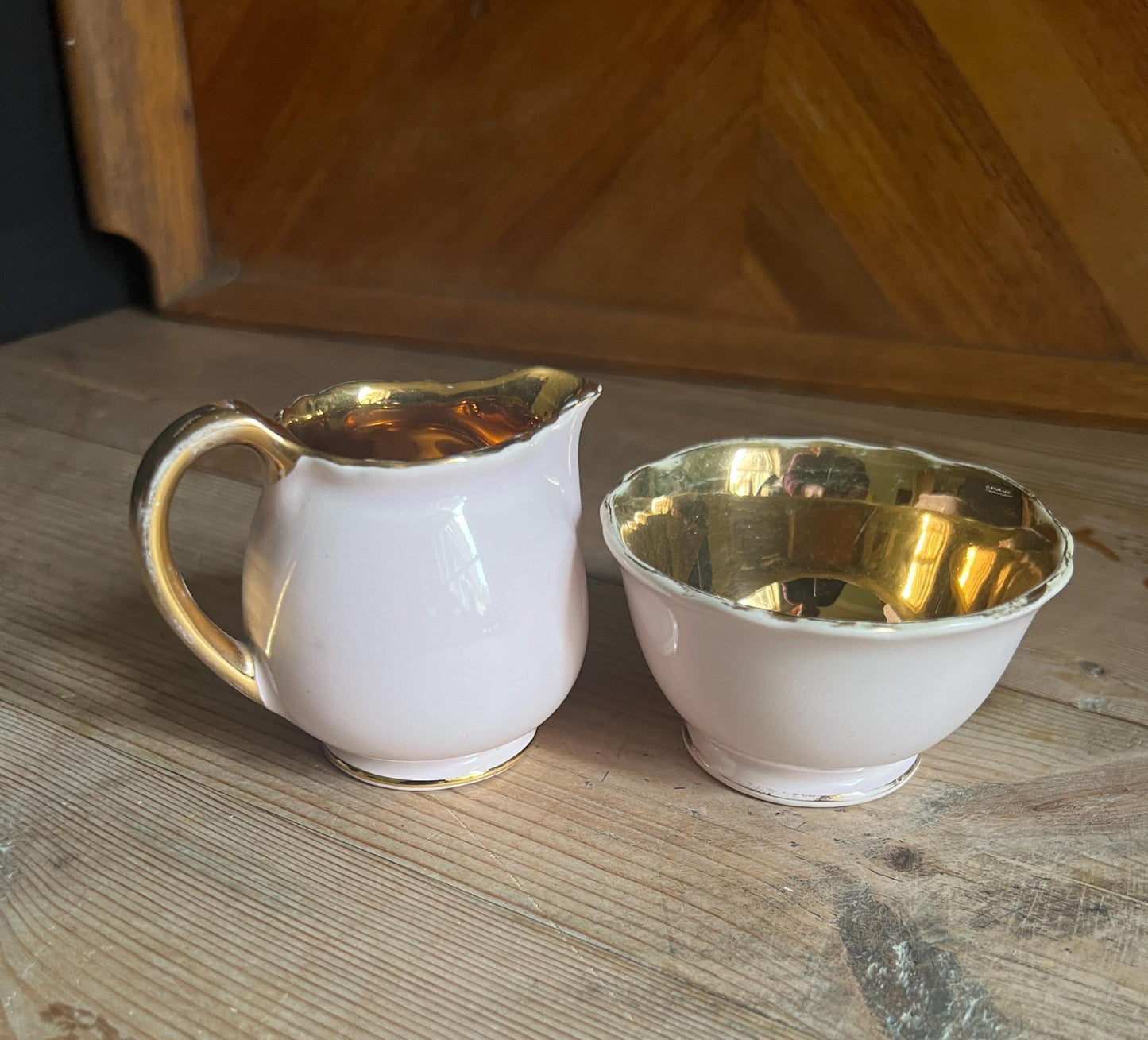 Beautiful pink gold lustre ceramic sugar and creamer set. Crown Devon Made in England.