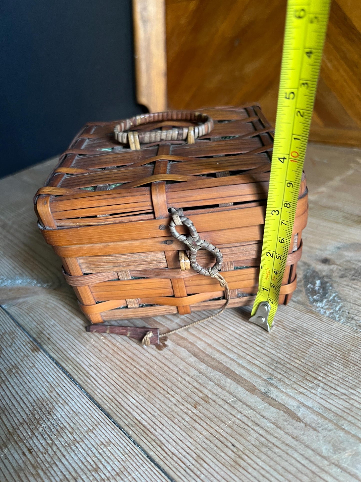 Vintage bamboo hand woven sewing basket. Green satin lined small lidded sewing basket.