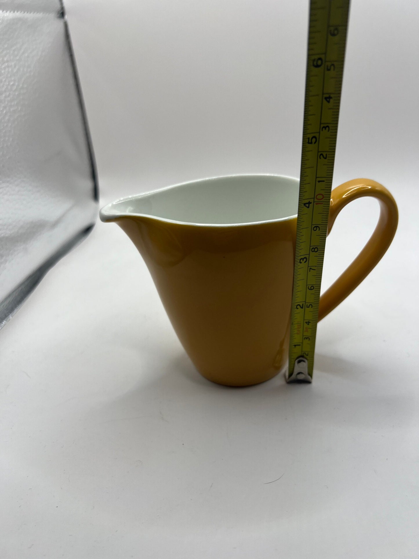 Vintage mustard yellow milk jug creamer. Stamped Johnson Bros England.