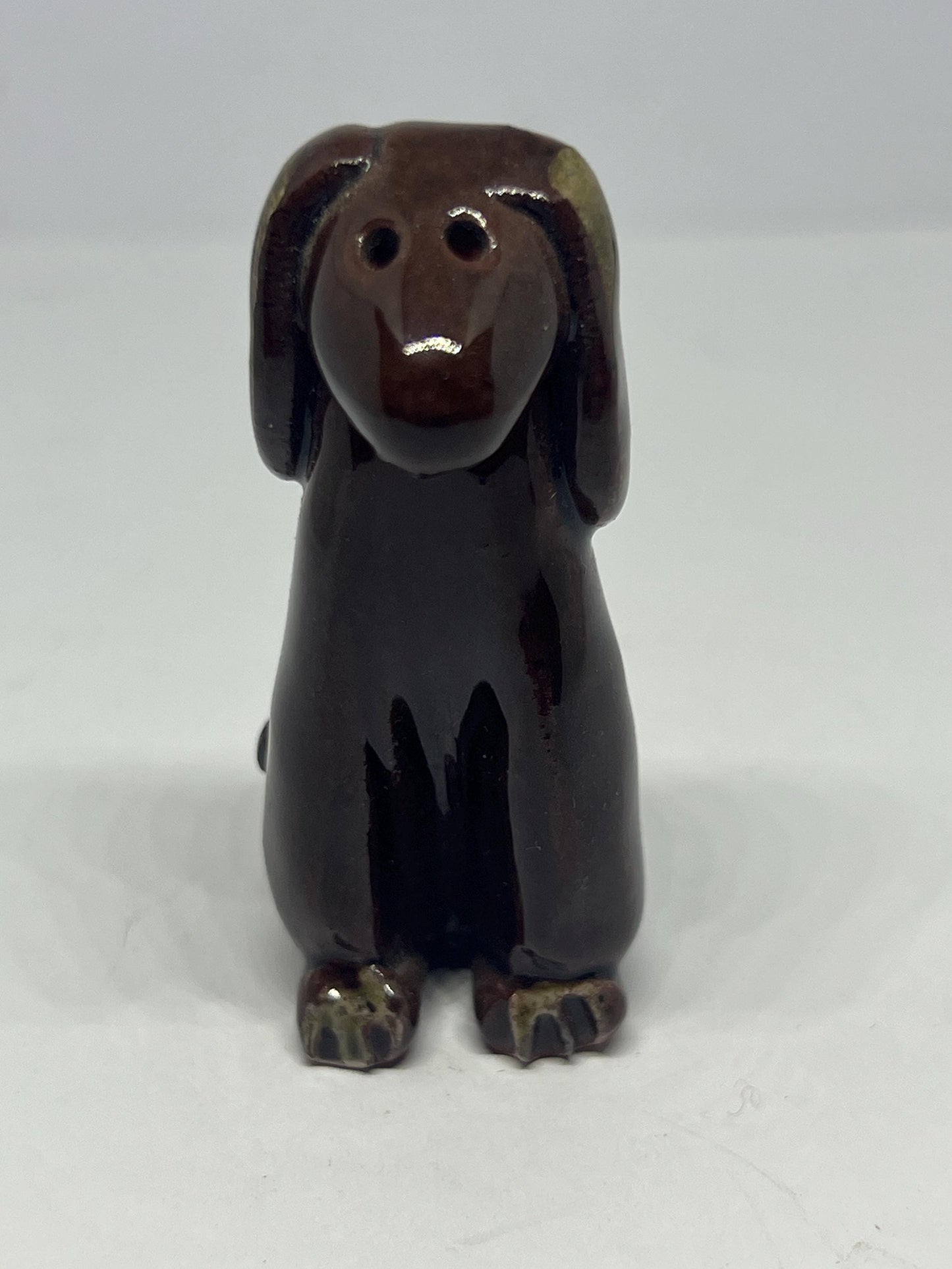 Tiny studio pottery dog figurine.