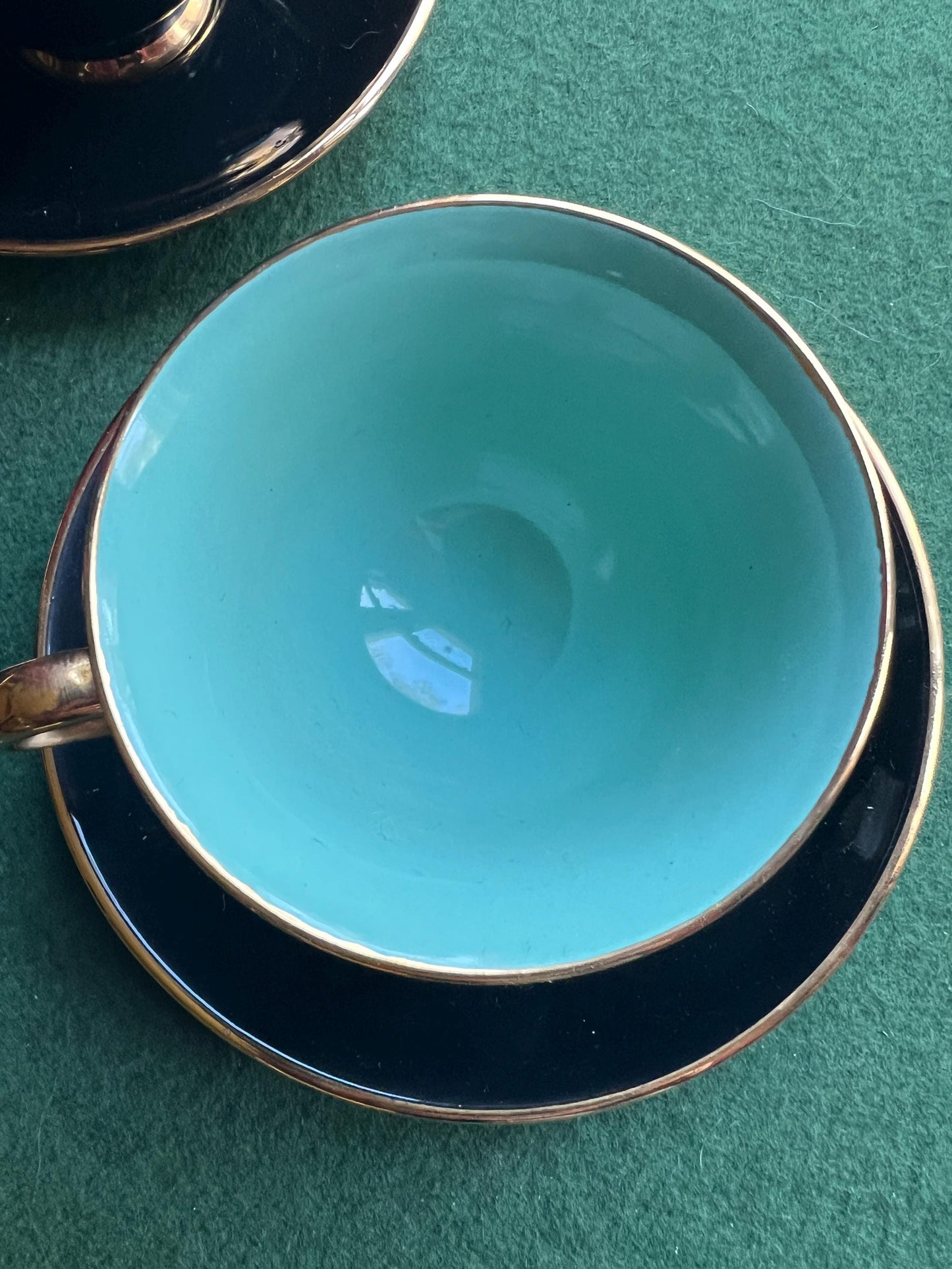 Vintage teacup and saucer. Stamped Stavangerflint  Norway Harlequin Palette.