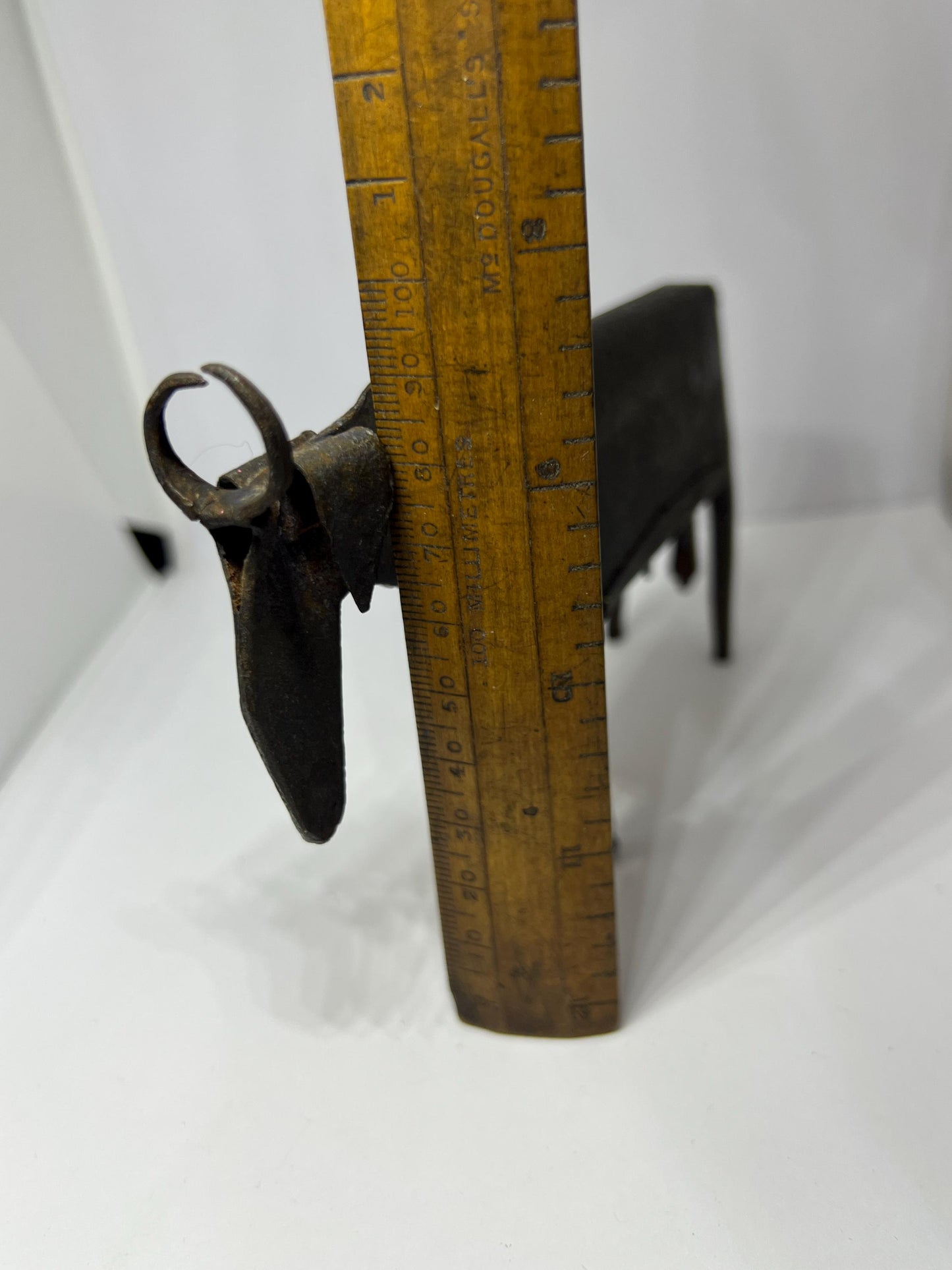 Brutalist metal cow sculpture.  Iron abstract folk art figurine.