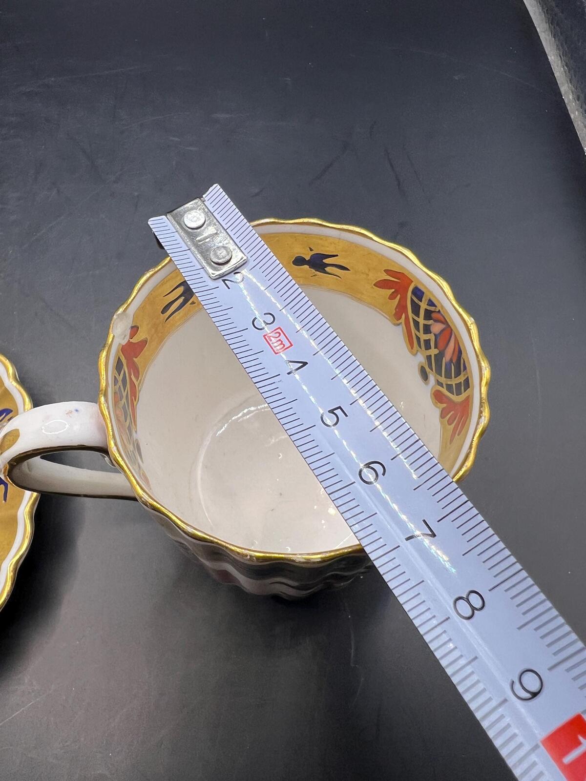 Antique coffee can / tea cup and saucer. Vibrant Imari pattern with gold gilt. Stamped Copeland 5.257. AS IS
