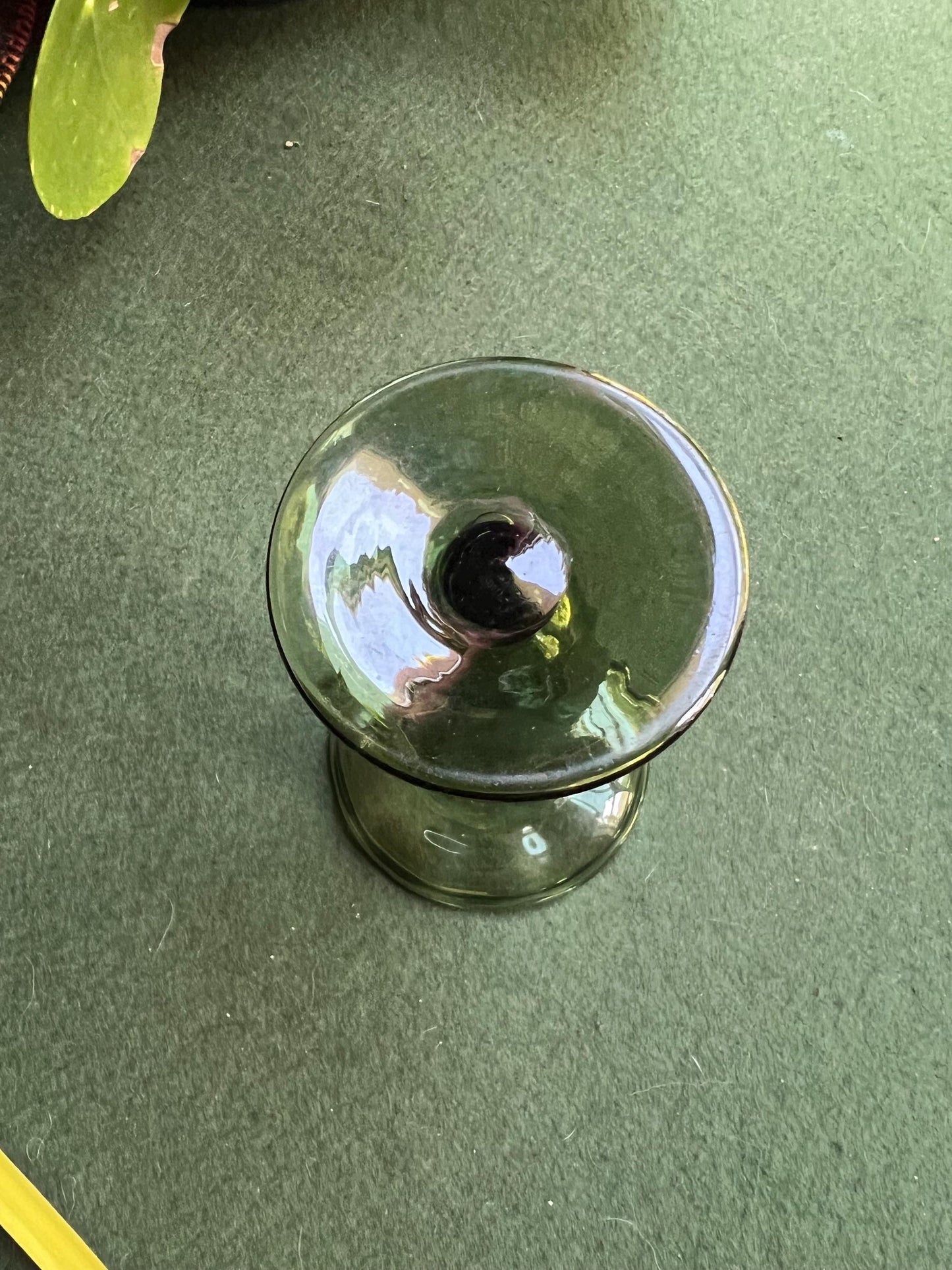 Green glass vase.